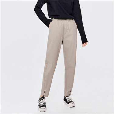 Stretchy pleated ankle length tapered pants