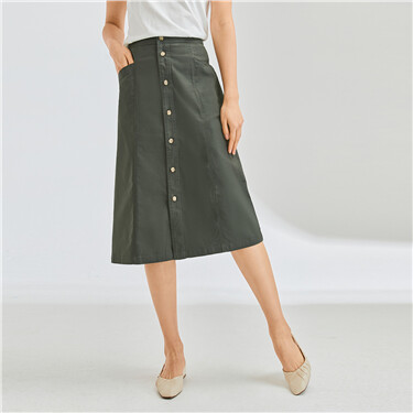 Solid color single-breasted button skirt