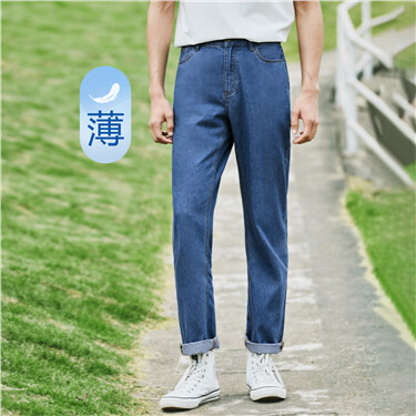 Mid rise five-pocket washed denim jeans