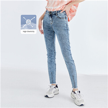 Stretchy raw edge ankle-length denim jeans